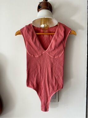 Woman’s Ribbed Pink One-Piece Bodysuit